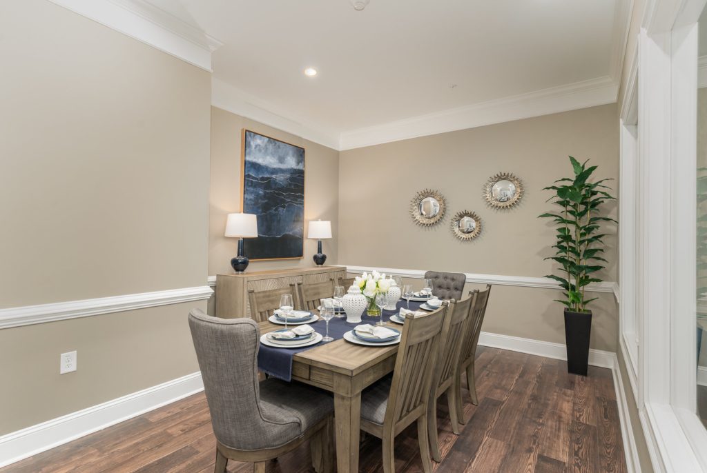 Bright and spacious dining area with stylish decor, large windows, and comfortable seating. Ideal for communal meals and gatherings.